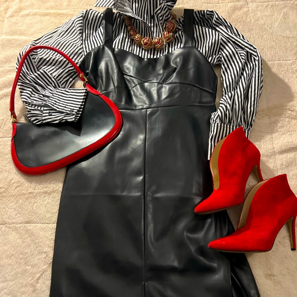 Curve-a-licious. Sassy, chic, faux leather little black dress.